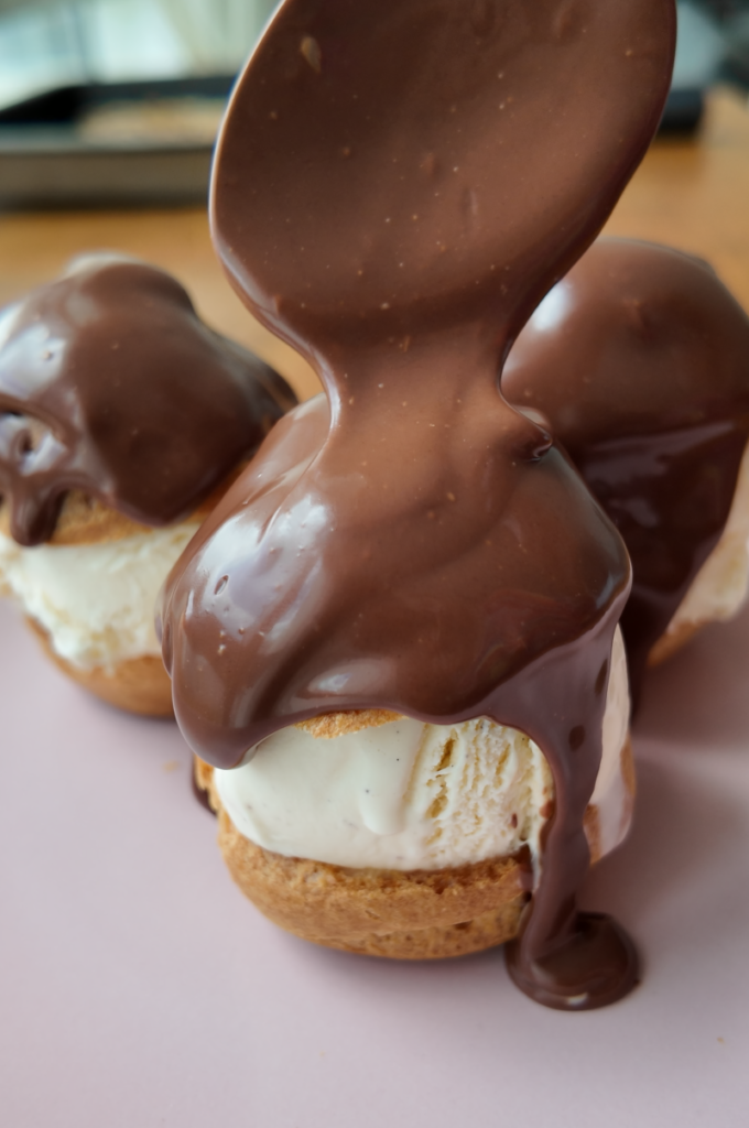 Chocolate Ganache dripping on the profiterole